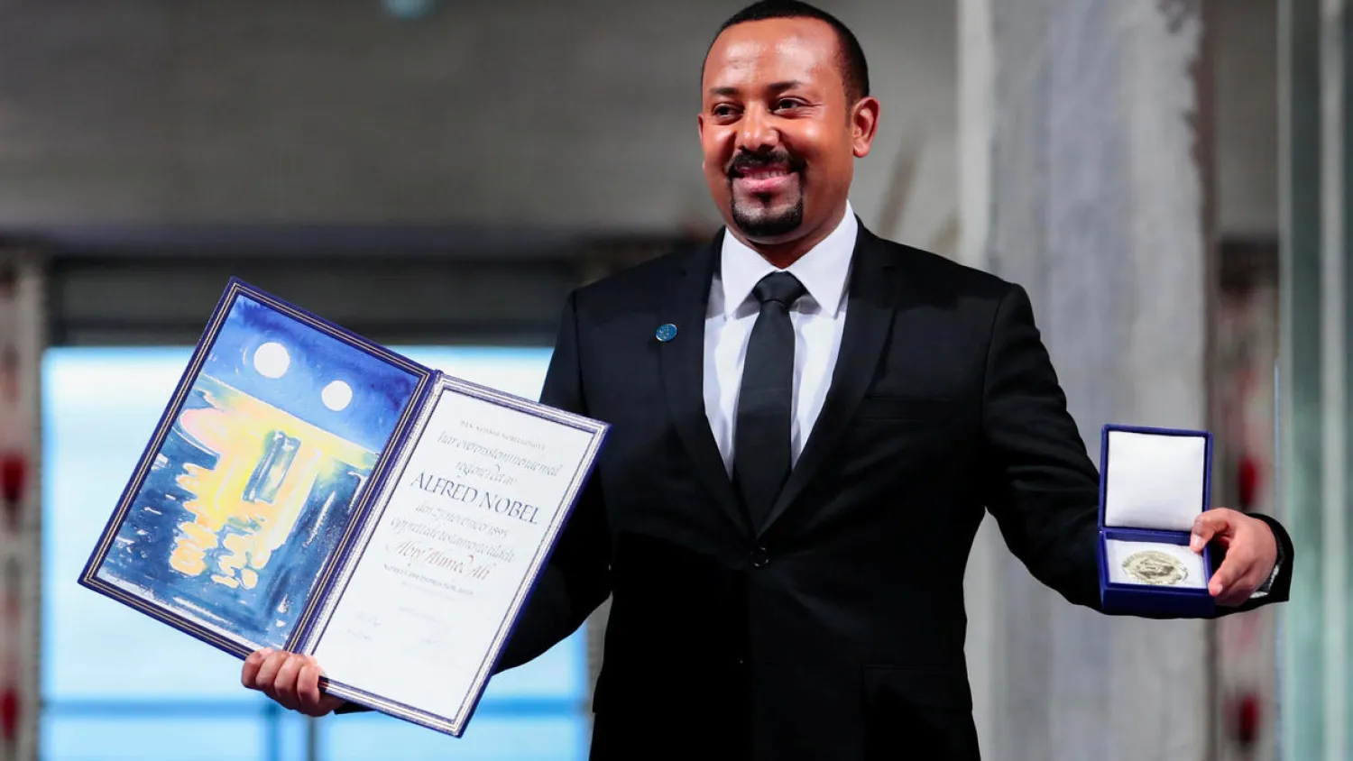 Ethiopian Prime Minister Abiy Ahmed poses with medal and diploma after receiving Nobel Peace Prize during ceremony in Oslo City Hall, Norway December 10, 2019. NTB Scanpix/Hakon Mosvold Larsen via REUTERS 