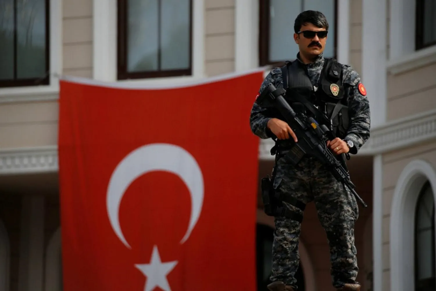 A special Police officer stands guard outside of Turkish President Erdogan's residence in Istanbul. (Reuters)