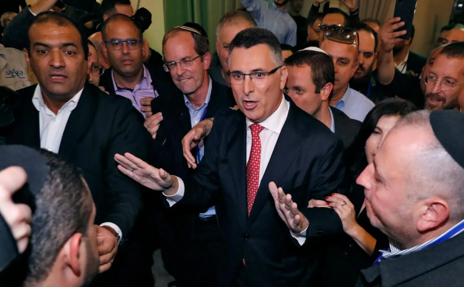 Gideon Saar greets supporters during the launch of his campaign for Likud party leadership in Or Yehuda, near Tel Aviv. (AFP)