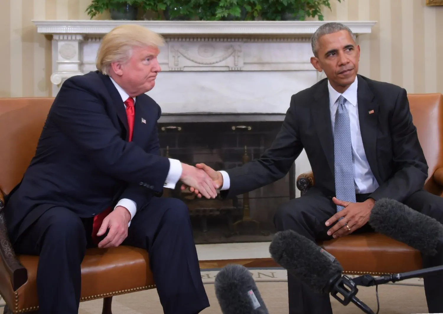 Barack Obama and Donald Trump are seen here after Trump's election in November 2016 | AFP
