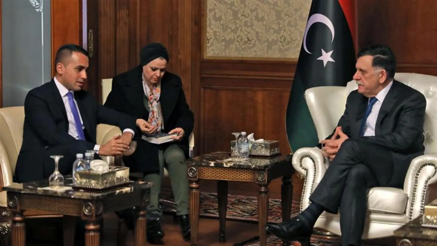 GNA leader Fayez al-Sarraj, right, meets Italian Foreign Minister Luigi Di Maio in Libya's capital, Tripoli. AFP