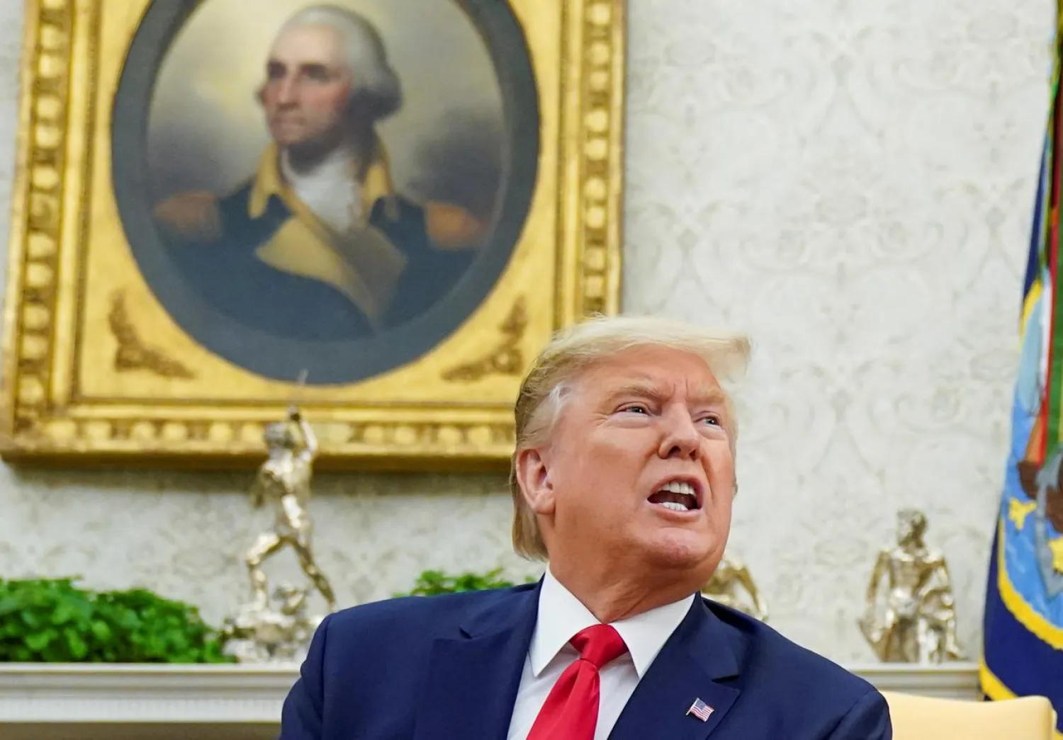 US President Donald Trump speaks during a meeting with Guatemala's President Jimmy Morales in the Oval Office of the White House in Washington, US, December 17, 2019. (Reuters)