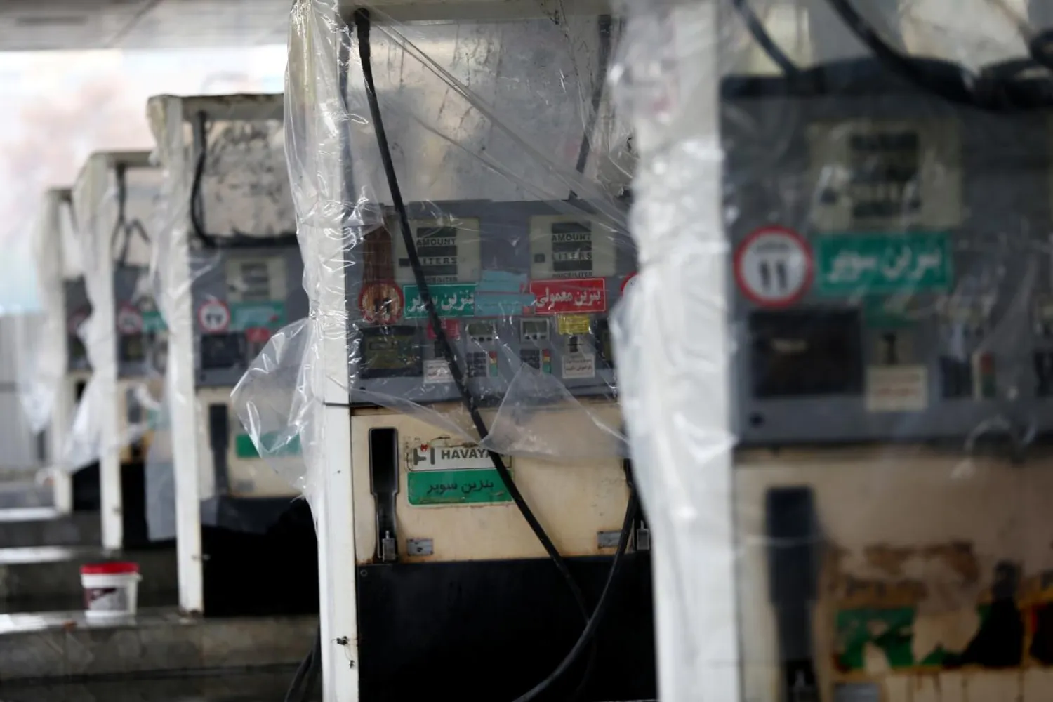 Destroyed petrol pumps are pictured at a gas station, after protests against increased fuel prices, in Tehran, Iran November 20, 2019. (Reuters)