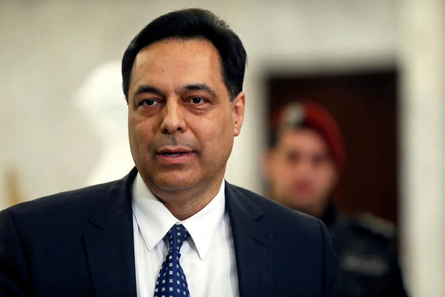 Hassan Diab talks to the media after being named Lebanon's new prime minister, at the presidential palace in Baabda, Lebanon December 19, 2019. (Reuters)