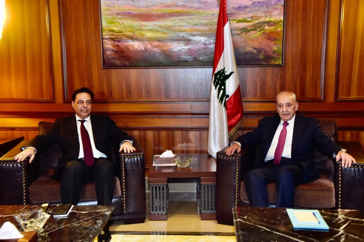 Lebanese PM-designate Hassan Diab (L) meets with parliament Speaker Nabih Berri. (Dalati & Nohra)