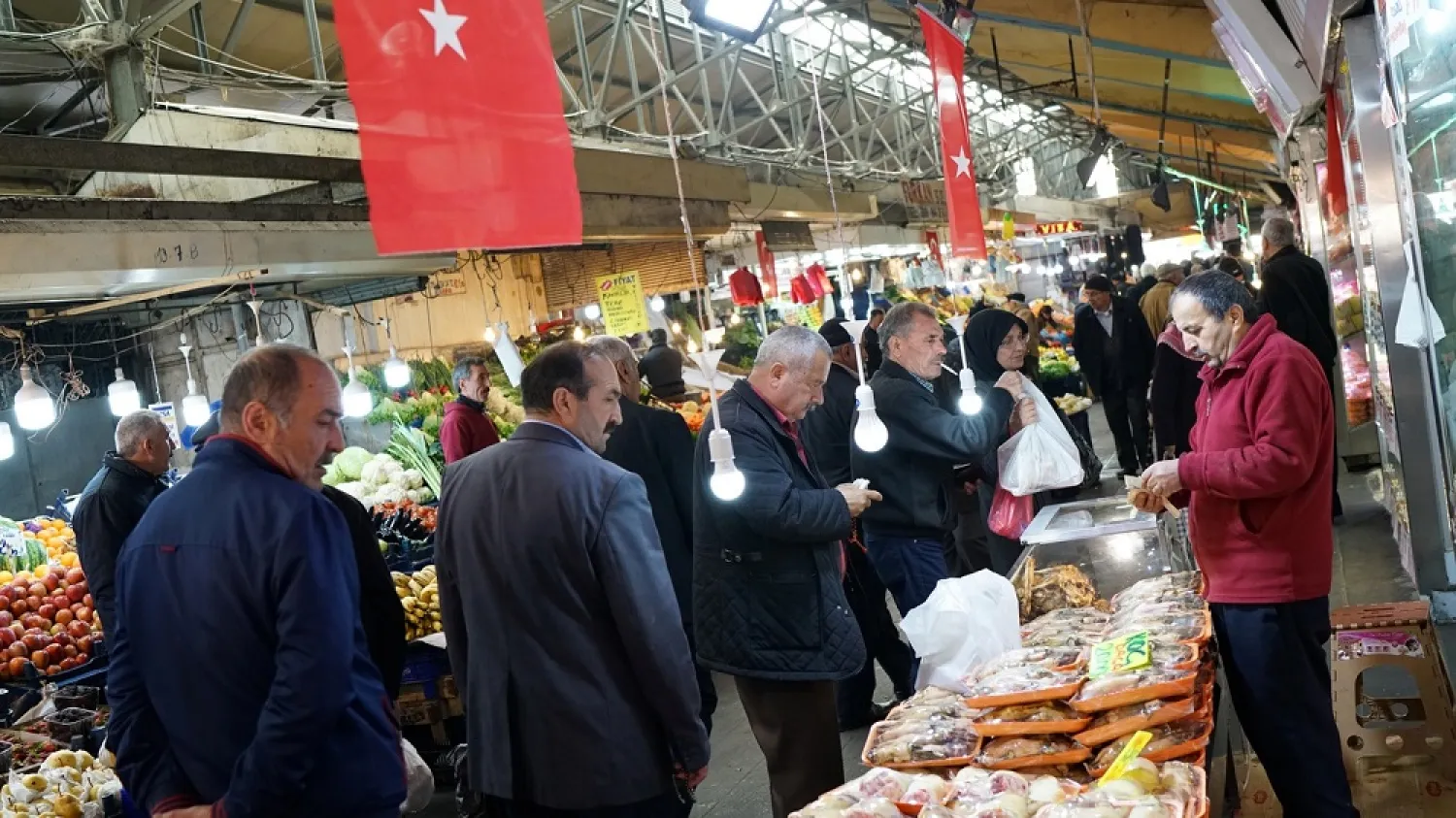 People shop at a market in Turkey. (Reuters)