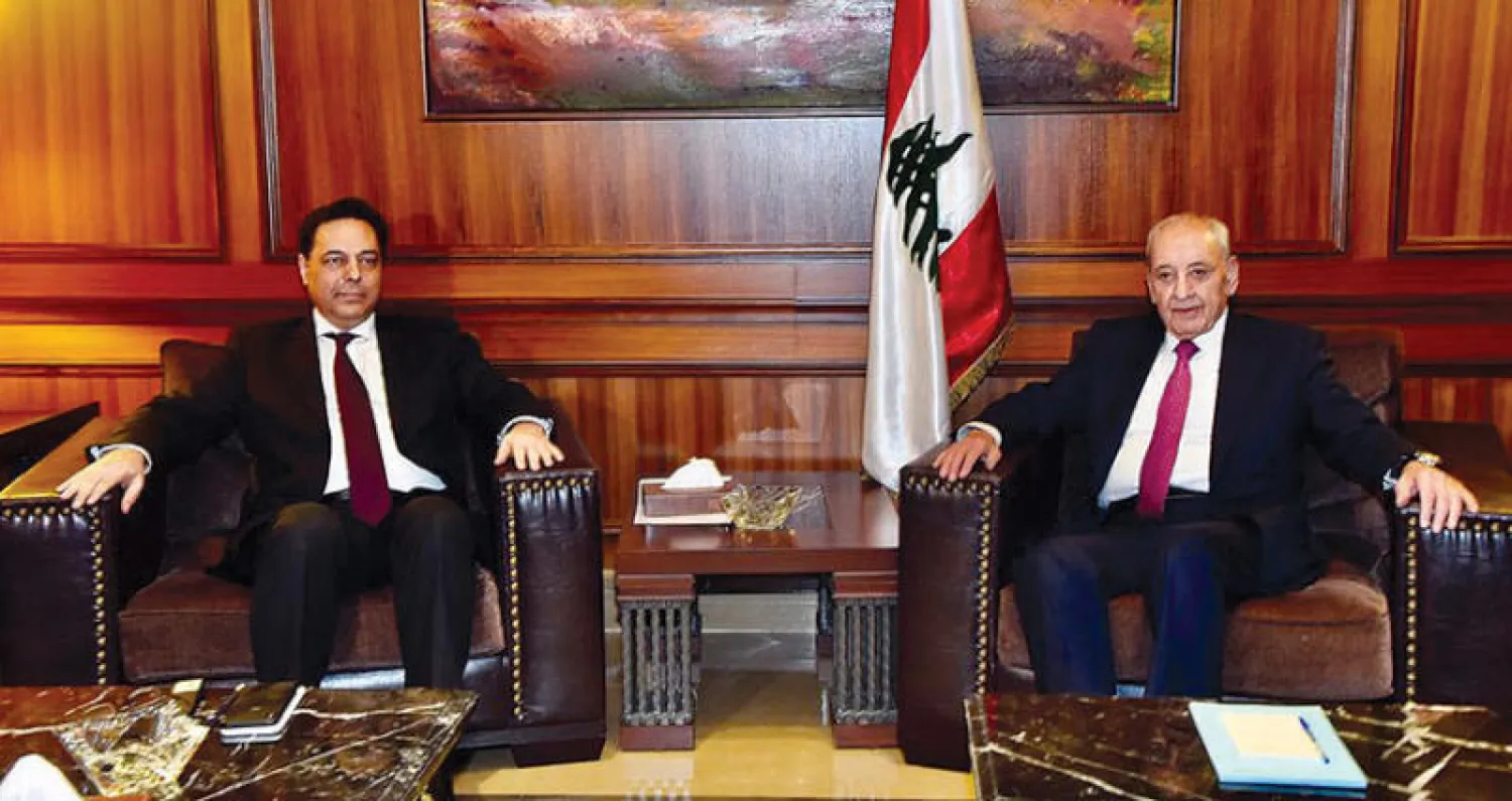 رئيس الحكومة المكلف حسان دياب مجتمعاً أمس مع الرئيس نبيه بري مع بدء الاستشارات النيابية (الوكالة الوطنية)
