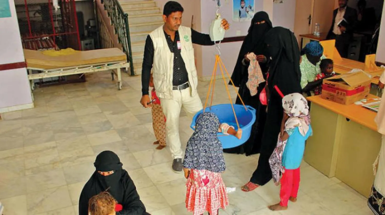 Children suffering from illness and receiving treatment in a hospital in Hajjah province, Yemen (AFP)
