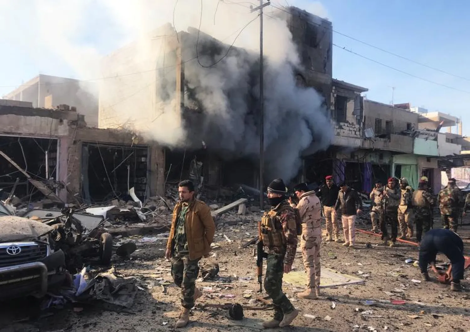 FILE: Smoke rises after a car bomb exploded in Iraqi border town of al-Qaim, Iraq January 11, 2019. REUTERS/Stringer.

