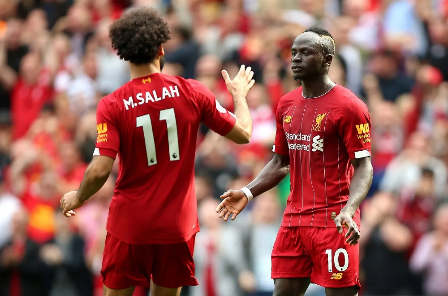 Two of Africa's top football stars, Liverpool teammates Mohamed Salah and Sadio Mane. (Getty Images)