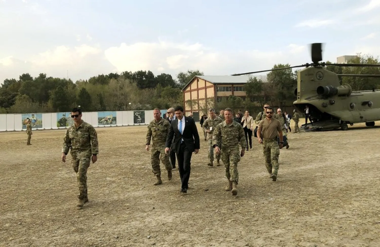 US Defense Secretary Mark Esper, center, walks Gen. Scott Miller, right, chief of the US-led coalition in Afghanistan, at the US military headquarters in Kabul, Afghanistan, Sunday, Oct. 20, 2019. - (AP Photo/Lolita C. Balbor)
