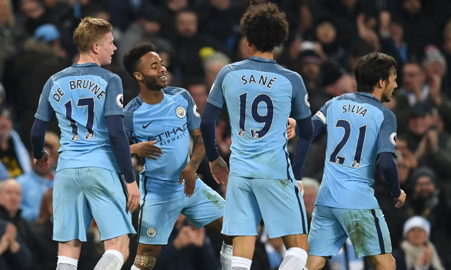 Raheem Sterling (second left) celebrates with Manchester City teammates Kevin De Bruyne, Leroy Sané and David Silva during a 2-1 win over Arsenal in December 2016.
Photograph: Paul Ellis/AFP/Getty Images
