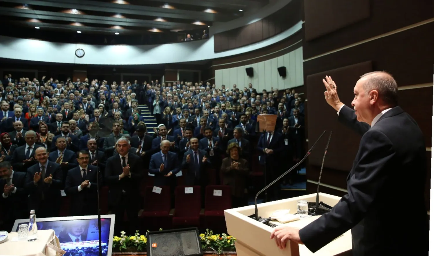 Turkey's President Recep Tayyip Erdogan gestures as he addresses the members of his ruling party, in Ankara, Turkey, Thursday, Dec. 26, 2019. (Turkish Presidency via AP, Pool)