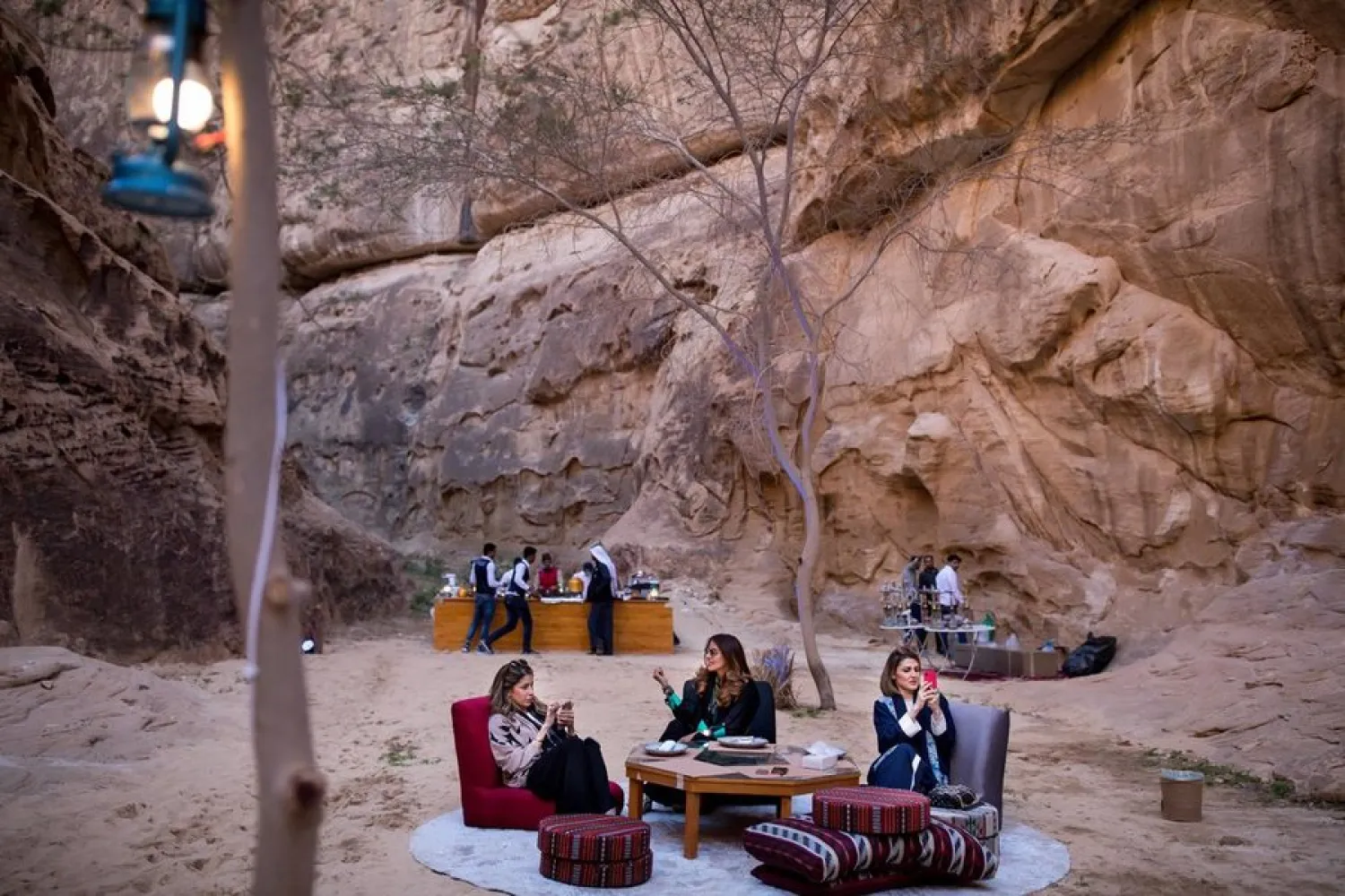 Tourists in Al-Ula, which includes ruins of an ancient city of carved rock tombs.Credit...Tasneem Alsultan for The New York Times
