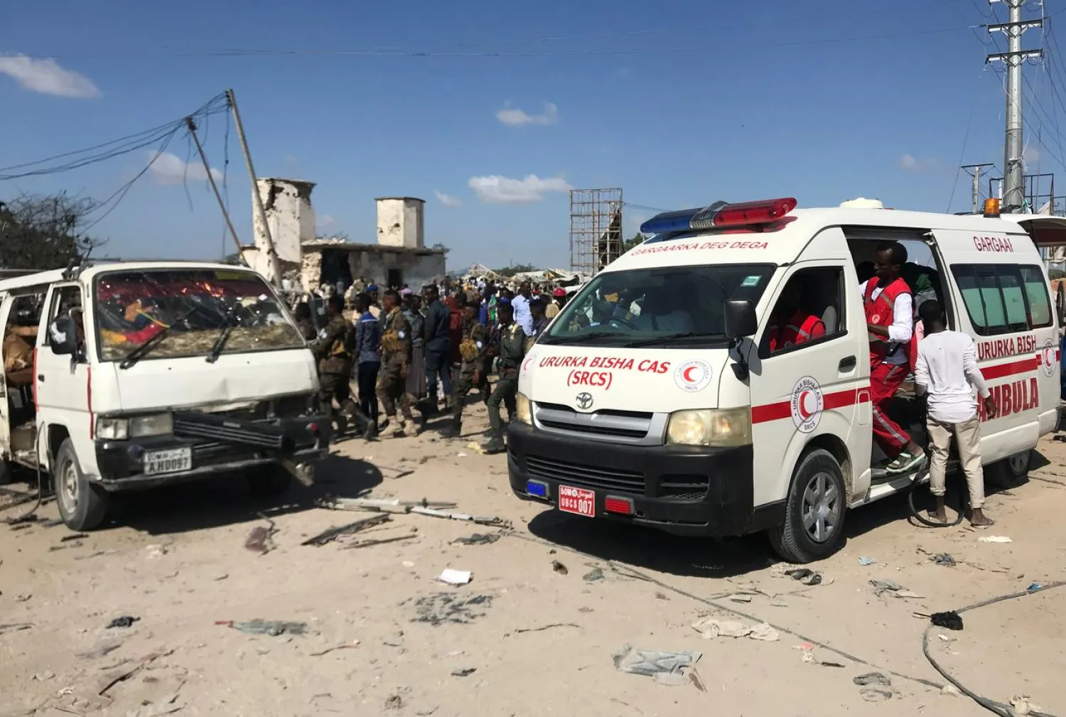 An ambulance leaves from the scene of a car bomb explosion at a checkpoint in Mogadishu, Somalia December 28, 2019. REUTERS/Feisal Omar