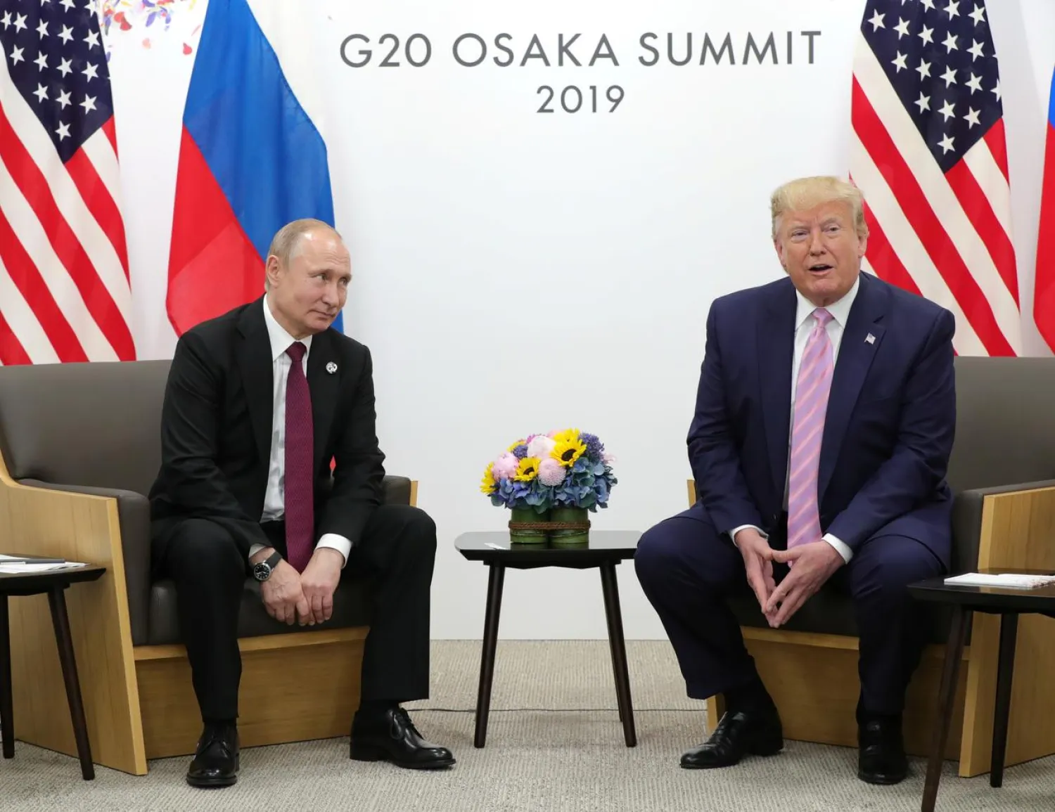 FILE PHOTO: Russia's President Vladimir Putin and US President Donald Trump attend a meeting on the sidelines of the G20 summit in Osaka, Japan June 28, 2019. Sputnik/Mikhail Klimentyev/Kremlin via REUTERS