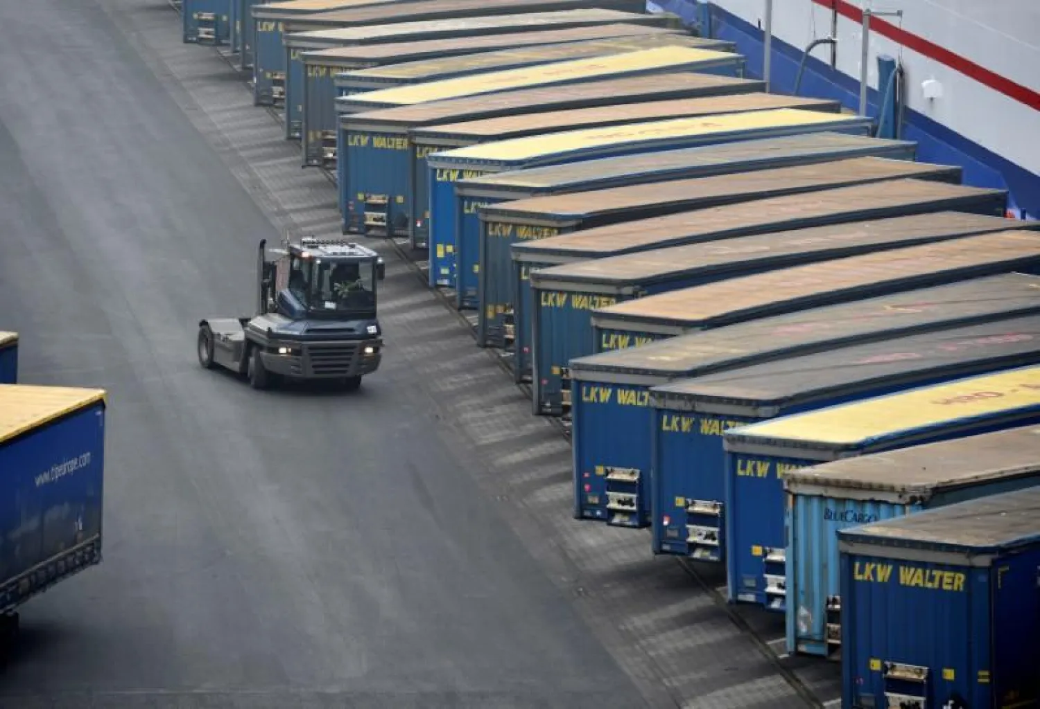 Containers are pictured at a loading terminal in the port of Kiel, Germany, January 25, 2017. (Reuters)