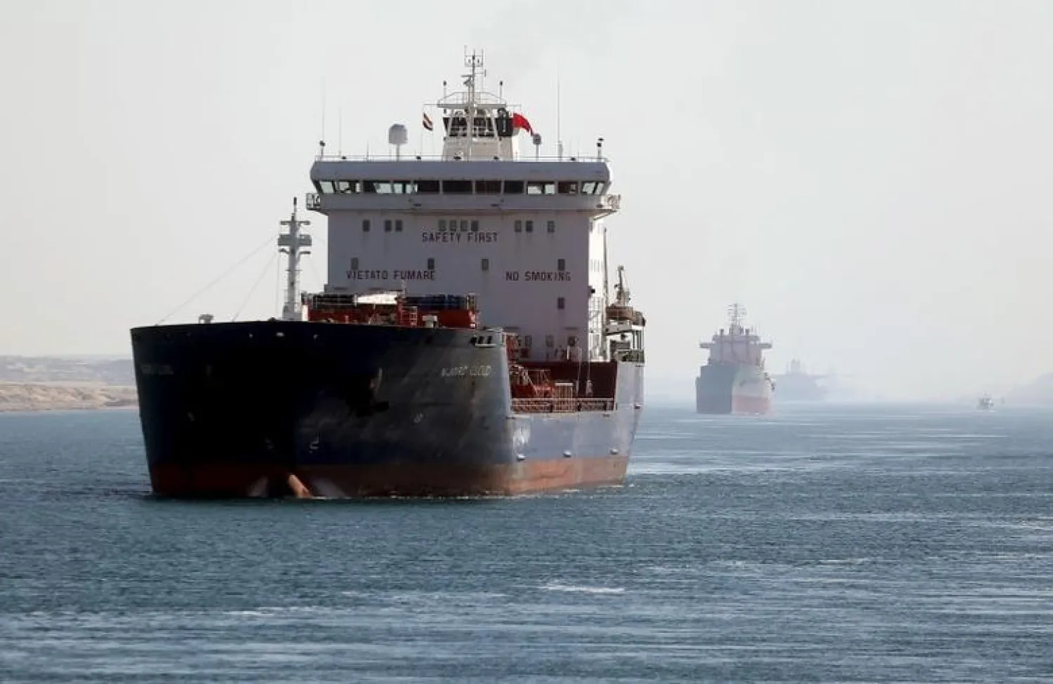 A cargo ship passes through the New Suez Canal in Ismailia, Egypt, (File photo: Reuters)
