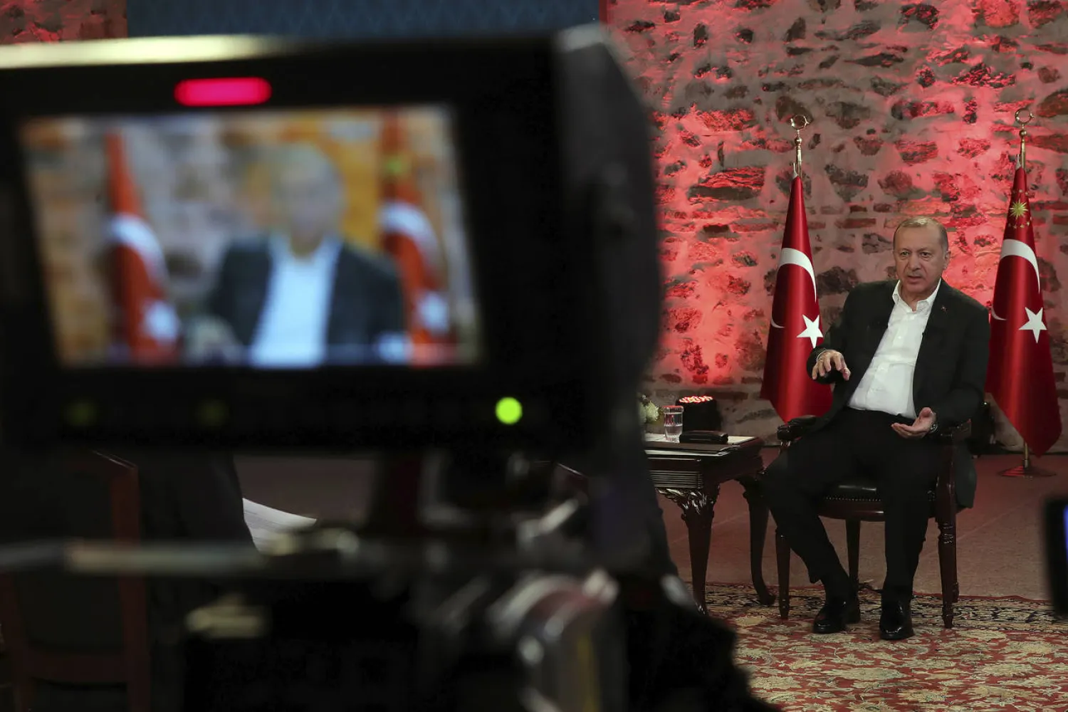 Turkey's President Recep Tayyip Erdogan speaks during a televised interviews in Istanbul, late Sunday, Jan. 5, 2020. (AP)