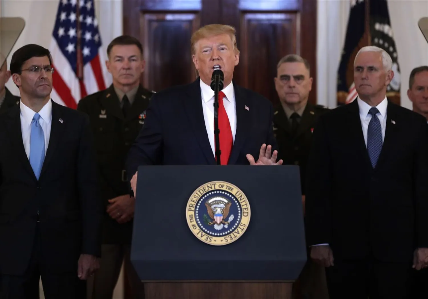 President Donald Trump addresses the nation from the White House on the ballistic missile strike that Iran launched against Iraqi air bases housing US troops, Wednesday, Jan. 8, 2020, in Washington. (AP Photo/ Evan Vucci)