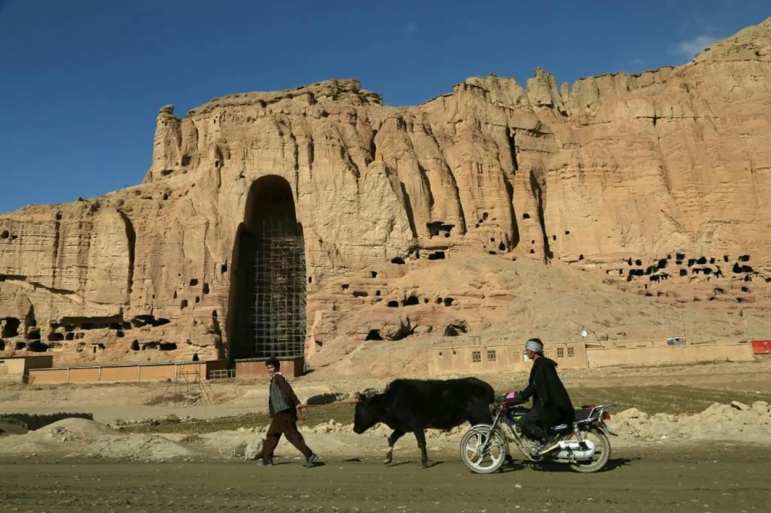 Experts say that a pattern of dry spells followed by heavy rain, and larger than usual spring snowmelts is putting historic art and architecture at risk of destruction in Afghanistan | AFP