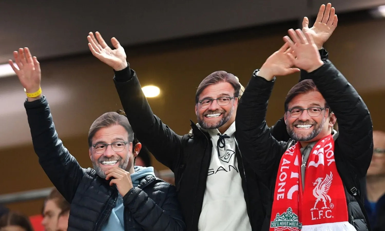 Fans wear Jürgen Klopp masks during the win over Sheffield United. (Getty Images)