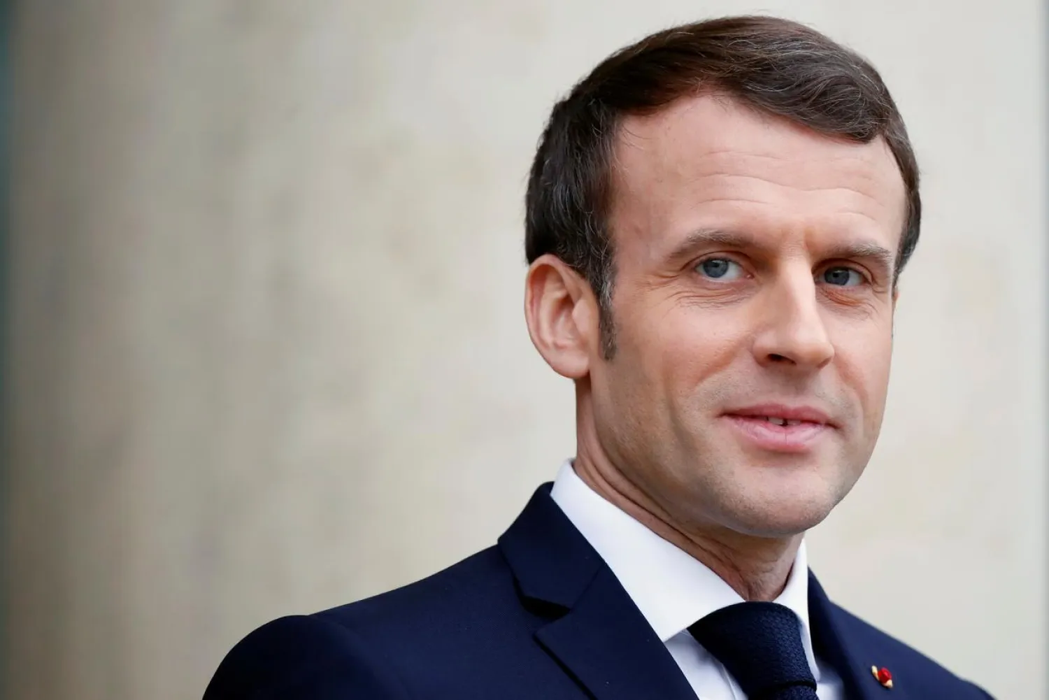 FILE PHOTO: French President Emmanuel Macron waits for a guest on the steps of the Elysee palace in Paris, France, January 7, 2020. REUTERS/Christian Hartmann