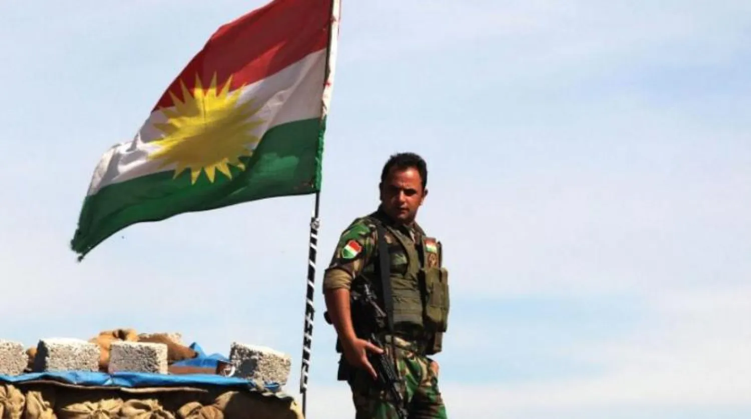 A Kurdish Peshmerga soldier stands at a lookout near Bashiqa in northern Iraq | REUTERS