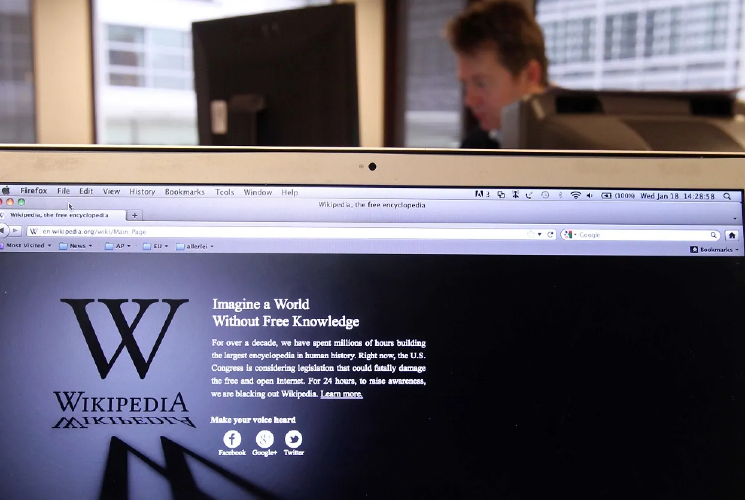 The webpage of the encyclopedia website Wikipedia shows a stark black-and-white page with the message, ‘Imagine a world without free knowledge’. (AP)
