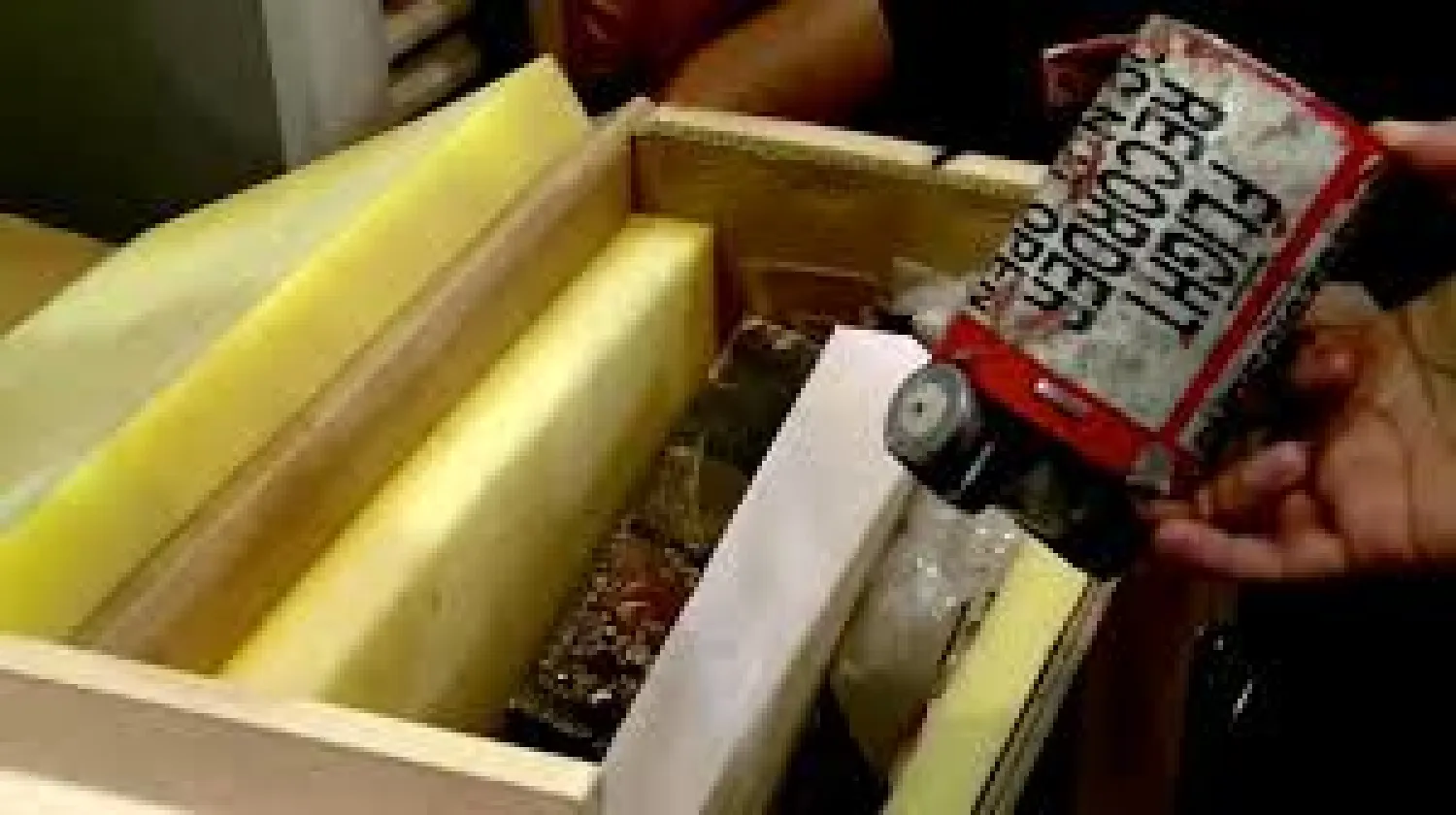 The crate containing purportedly the two black boxes recovered from the crashed Ukrainian airliner, Boeing 737-800, is seen in this still image taken from a video, in Tehran, Iran January 10, 2020. IRIB VIA WANA/Handout via REUTERS 