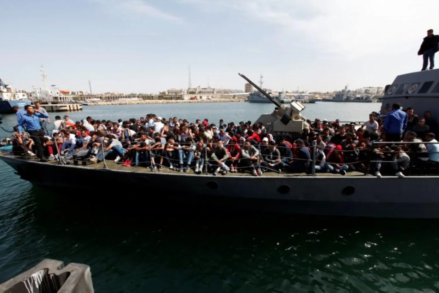 Illegal migrants arrive by boat at a naval base after they were rescued by Libyan coastguard in the coastal city of Tripoli, Libya, May 10, 2017. REUTERS/Ismail Zitouny
