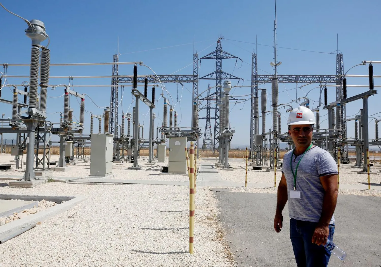 An Israeli engineer stands in the new electrical substation near the West Bank city of Jenin July 10, 2017. (Reuters)