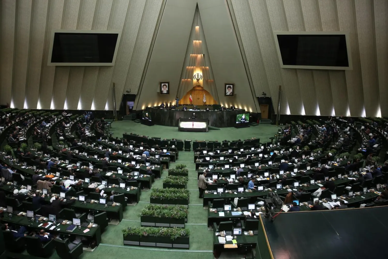 Iranian President Hassan Rouhani speaks during a session of parliament in Tehran, Iran, December 8, 2019. Official President website/Handout via REUTERS