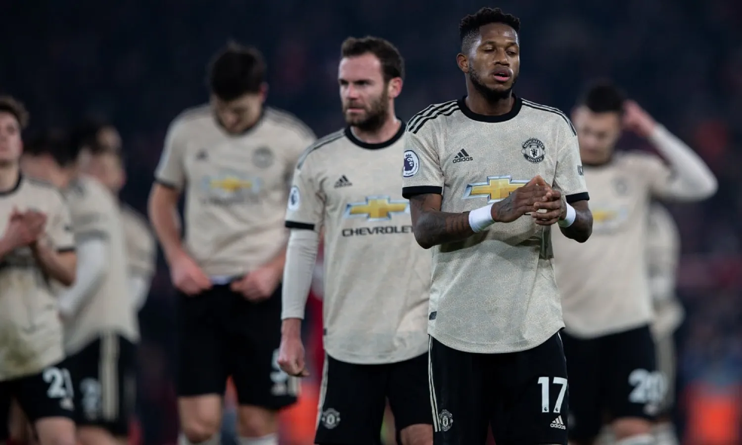 Manchester United players react after their Premier League defeat at Anfield. (Getty Images)