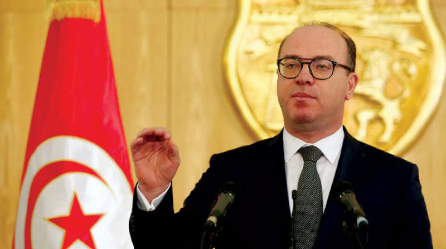 رئيس الحكومة التونسية المكلف إلياس الفخفاخ خلال المؤتمر الصحافي الذي عقده في العاصمة أمس (رويترز)