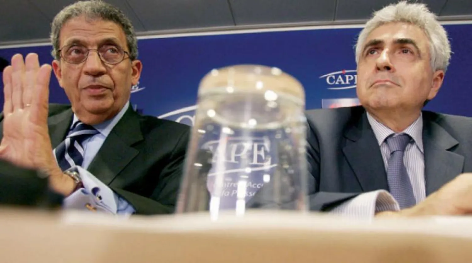 AFP file photo of Nassif Hitti with former Arab League chief Amr Moussa.