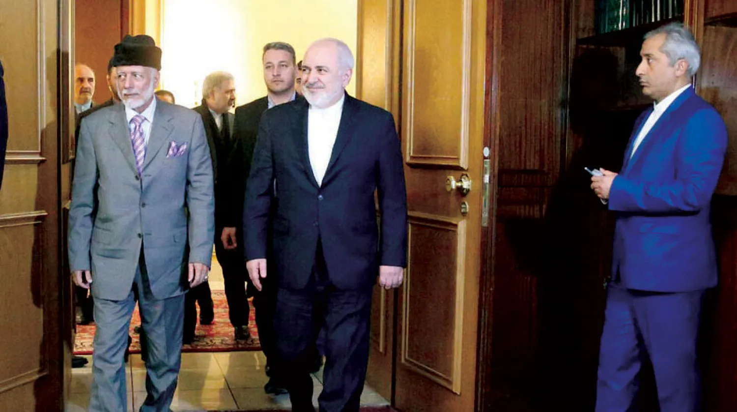 وزير الخارجية الإيراني يستقبل نظيره العماني في طهران أمس (إرنا)