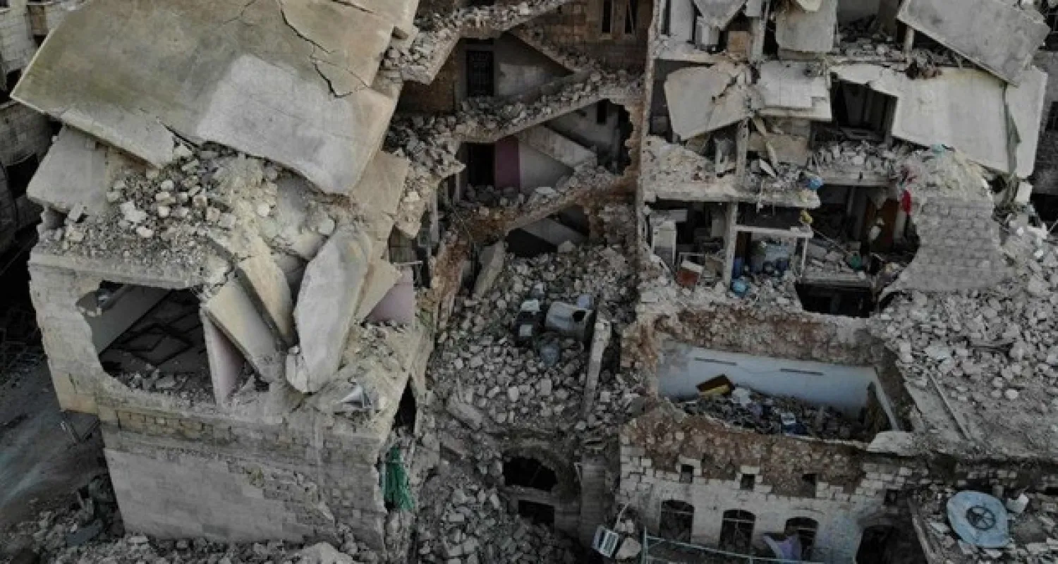 An aerial view shows a heavily damaged residential building that was hit during recent airstrikes by pro-regime forces in the city of Maarat al-Numan in Syria's northwestern Idlib province, on Jan. 25, 2020. (AFP Photo)
