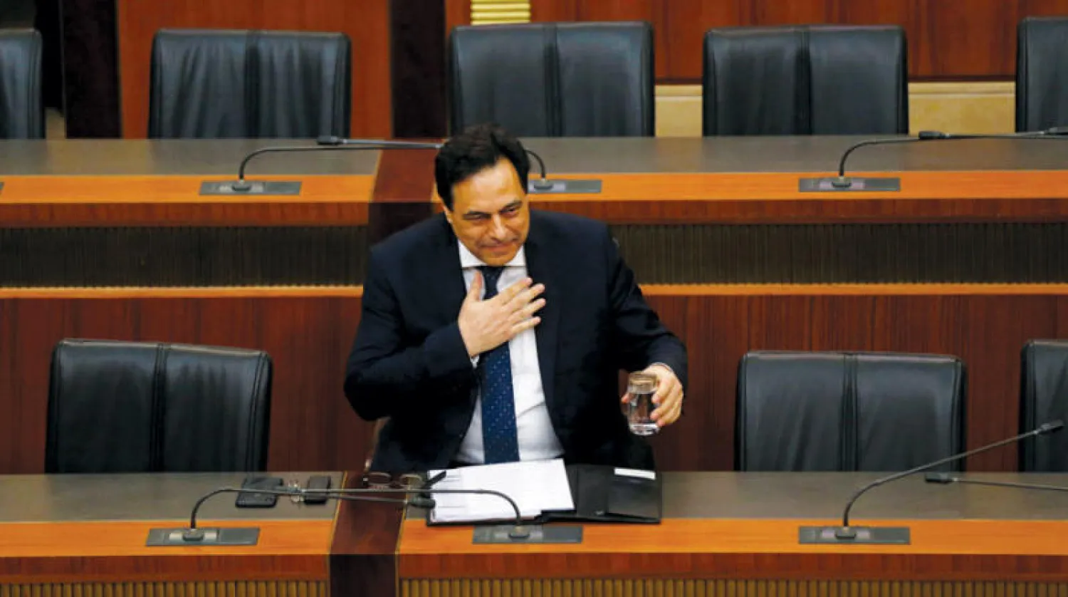 رئيس الحكومة الجديد حسان دياب في جلسة سابقة للبرلمان اللبناني (رويترز)