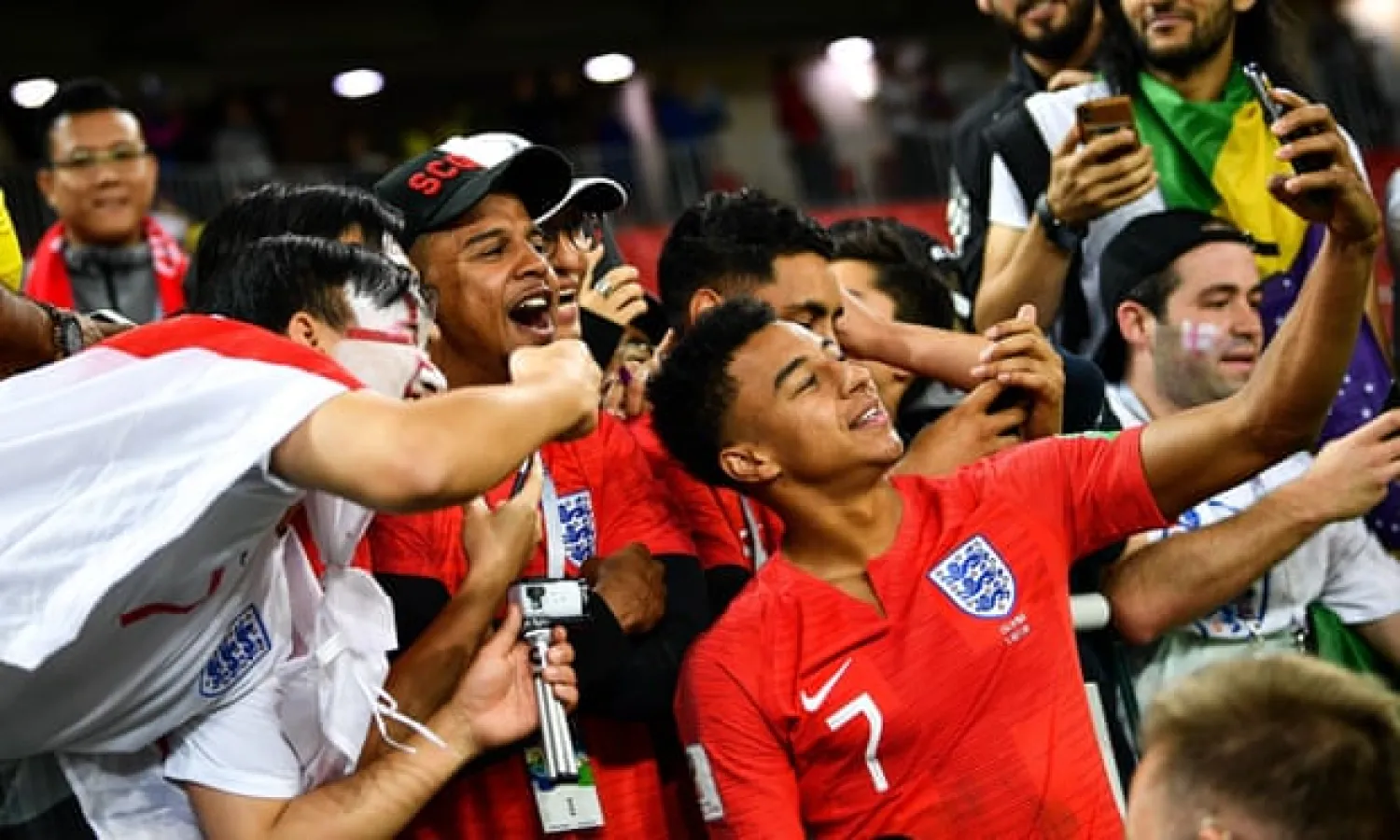  Jesse Lingard takes a selfie with his family and friends after England beat Colombia in the 2018 World Cup. Photograph: Imaginechina/REX/Shutterstock
