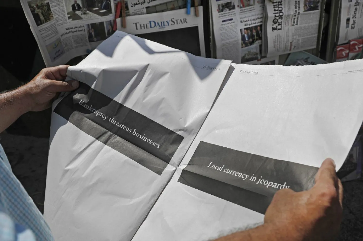 Lebanon's English-language The Daily Star starkly set out the problems facing the Beirut press in a newsless black issue on August 8 | AFP