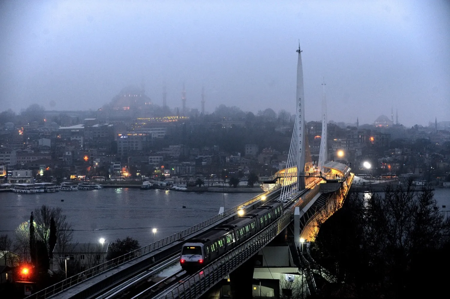 A metro train crosses the Istanbul's Golden Horn. (AFP)