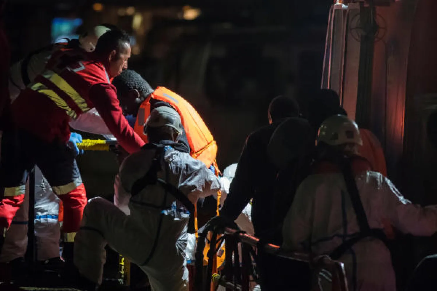 Migrants arrive aboard a Spanish maritime rescue boat after being rescued at sea off the Canary Islands coast, at the port of Arguineguin on the island of Gran Canaria, Spain, December 6, 2019. REUTERS/Borja Suarez
