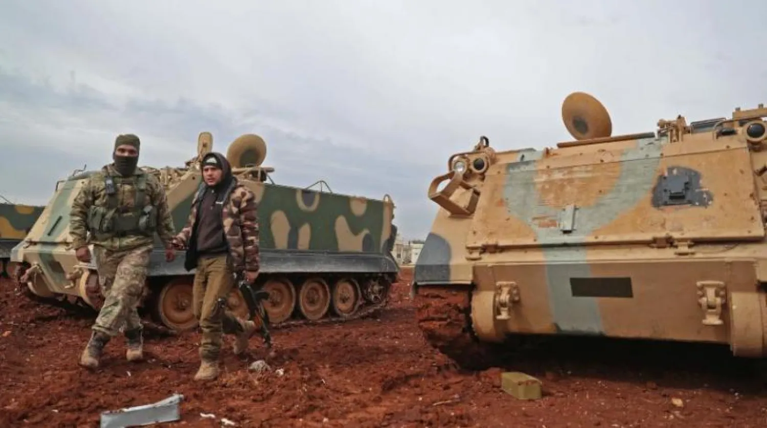 Türkiye tarafından desteklenen iki Suriyeli savaşçı (AFP)