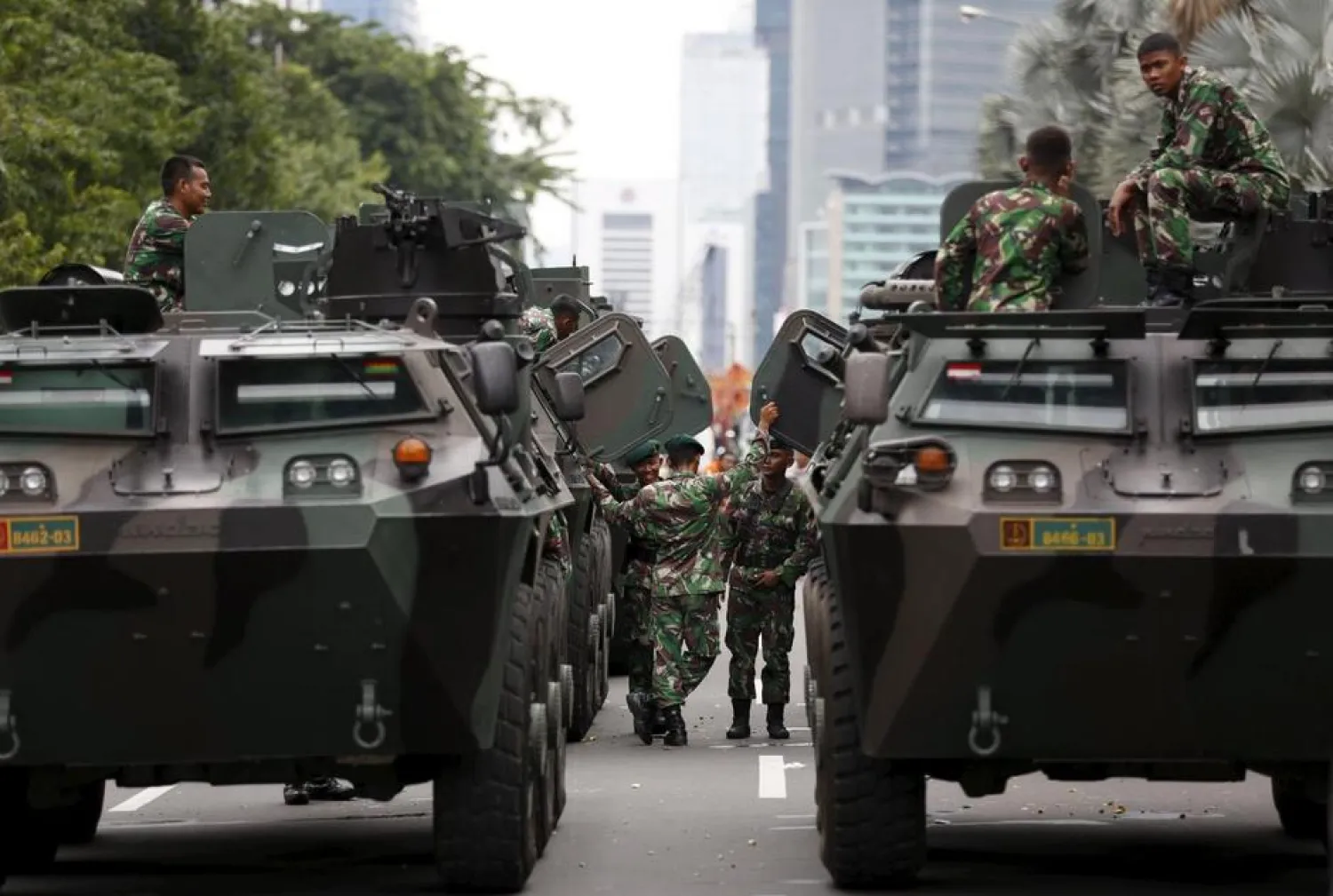 Military armored personnel carriers are seen in central Jakarta January 14, 2016. REUTERS/Darren Whiteside