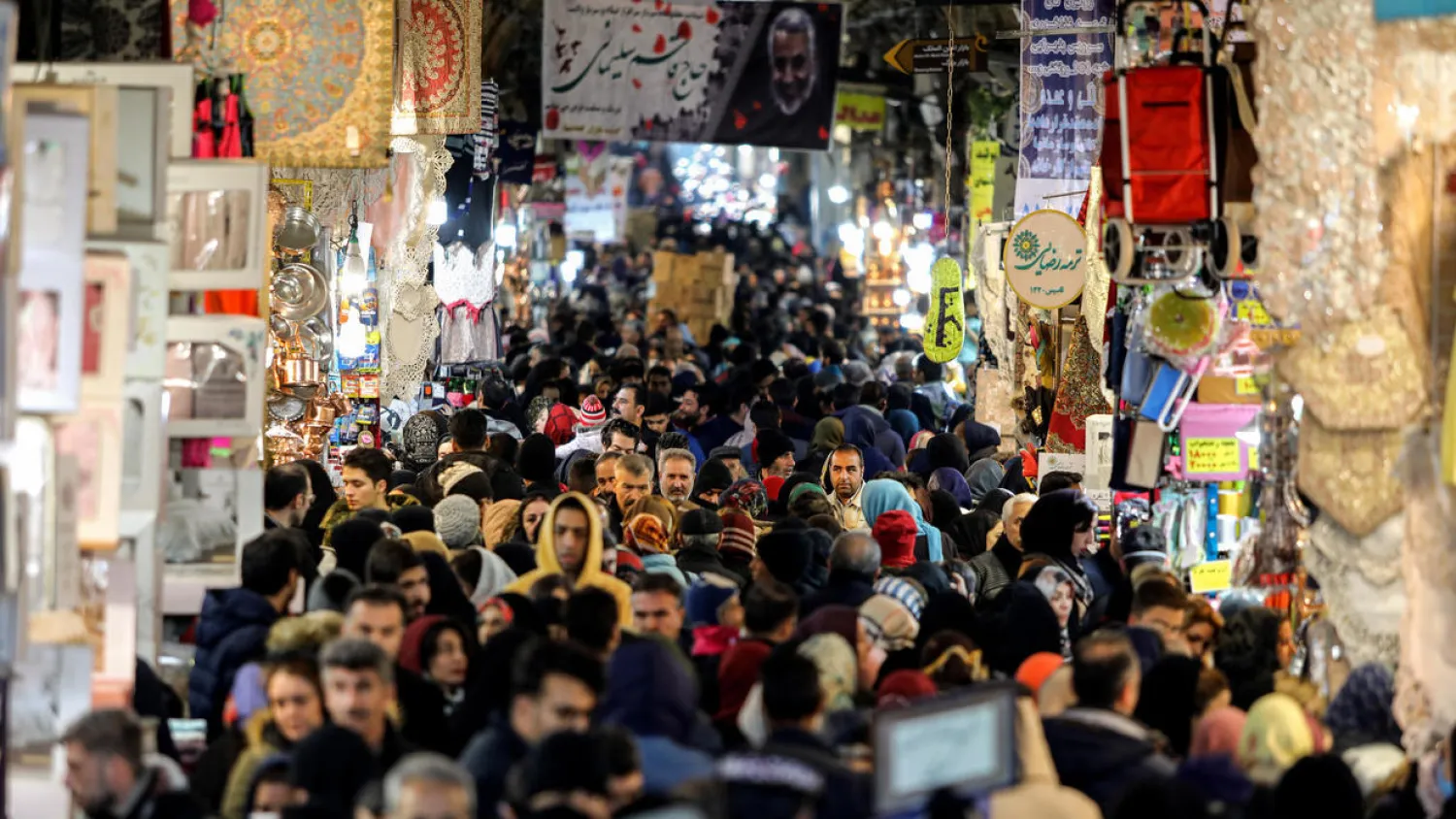 Shoppers in Tehran's Grand Bazaar said they would abstain in this week's elections to express their anger at the country's situation. (AFP)