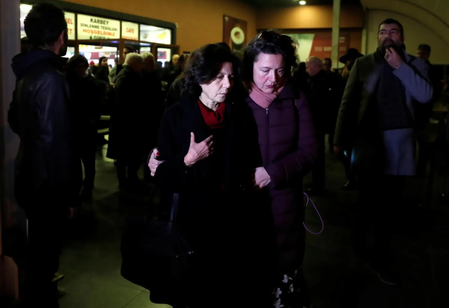 Ayse Bugra, wife of Osman Kavala, leaves a restaurant after learning that Istanbul prosecutor's office demanded the detention of her husband, in Silivri, near Istanbul, Turkey, February 18, 2020. (Reuters)