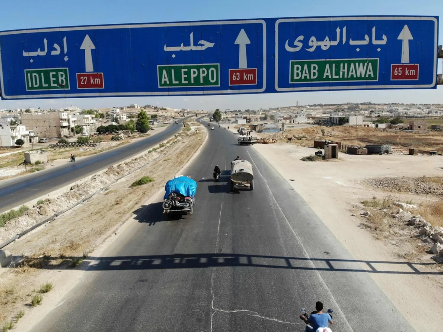 The M4 and M5 international highways connecting northern Syria to its south and west are vital for the warring parties. (AFP)