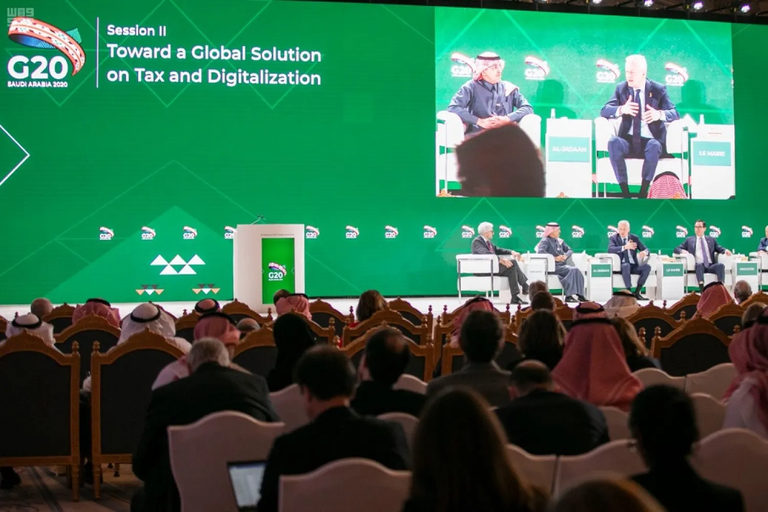 G20 organizers in Saudi Arabia host a symposium on international taxation, focused on the challenges arising from the digitalization of the global economy. (SPA)