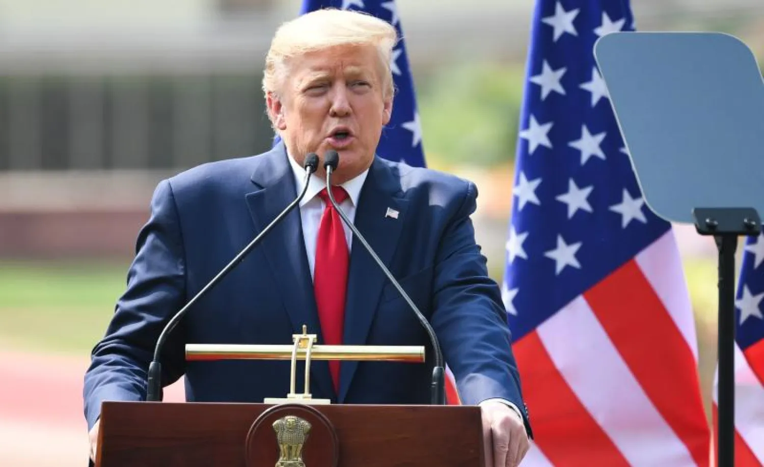 الرئيس الأميركي دونالد ترمب يلقي كلمة خلال مؤتمر صحافي مشترك مع رئيس وزراء الهند ناريندرا مودي في نيودلهي (أ.ف.ب)